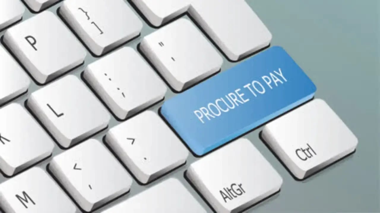 Close-up of a computer keyboard with a custom blue key labeled 'Procure to Pay,' symbolizing financial workflow automation.