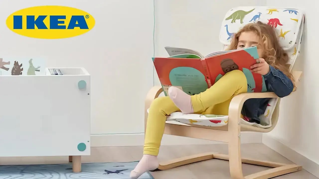 A young child sitting in an IKEA Poang chair, illustrating a consumer-facing product assembly guide.